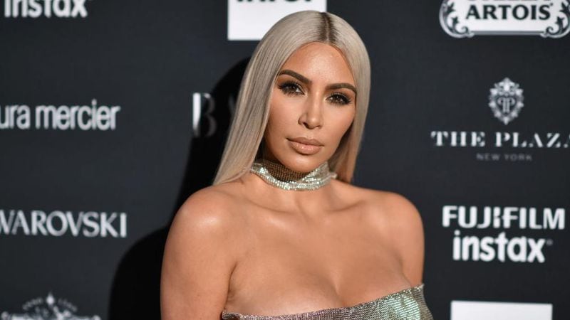 Kim Kardashian West seems to confirm she and Kanye West are expecting a third child in a trailer for season 14 of "Keeping Up with the Kardashians."