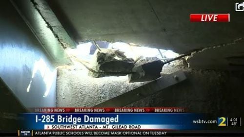 The hole in the road surface on I-285 was about 18 inches wide and 6 feet long.