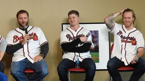 Mike Foltynewicz (right) took part in a roundtable session at Braves FanFest on Saturday. He was joined by A.J. Pierzynski (left) and Gordon Beckham. Foltynewicz is recovering from September surgery to remove part of a rib after blood clots were found in his arm. HYOSUB SHIN / HSHIN@AJC.COM