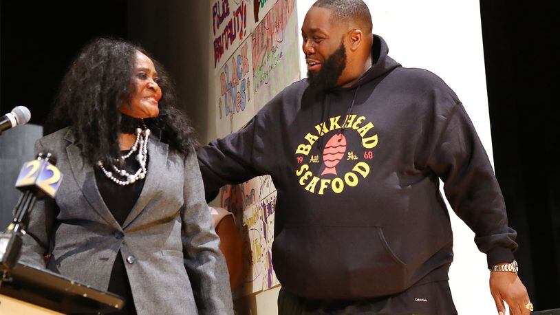 During his kickoff event for Bankhead Seafood, Michael Render (aka Killer Mike) introduces former owner Helen Brown Harden while speaking Thursday, Feb. 27, 2020, at his alma mater Frederick Douglass High School in Atlanta. CURTIS COMPTON / CCOMPTON@AJC.COM