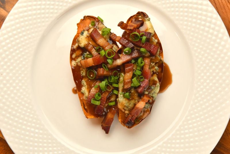 Joey Ward shares one of his favorite at-home dishes, Baked Sweet Potato with Blue Cheese, Maple and Bacon. (Styling by Joey Ward / Chris Hunt for the AJC)