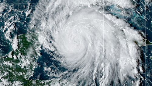 Hurricane Ian put much of Florida on alert Monday as it moved over the northwest Caribbean and Cuba on Monday September 26, 2021