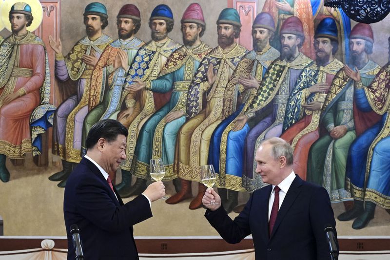 FILE - Russian President Vladimir Putin, right, and Chinese President Xi Jinping toast during their dinner at The Palace of the Facets, a building in the Moscow Kremlin, Russia, on March 21, 2023. Europe wants two things from China: First, a shift in its relatively pro-Russia position on the war in Ukraine. Second, a reduction in the trade imbalance. It’s not clear if it will get very far on either front. (Pavel Byrkin, Sputnik, Kremlin Pool Photo via AP, File)