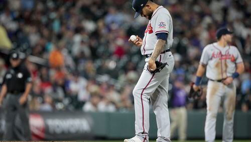 Atlanta Braves starting pitcher Huascar Ynoa (19) holds the ball and waits for to be taken out of a game against the Colorado Rockies in the sixth inning of a baseball game in Denver, Friday, Sept. 3, 2021. (AP Photo/Joe Mahoney)
