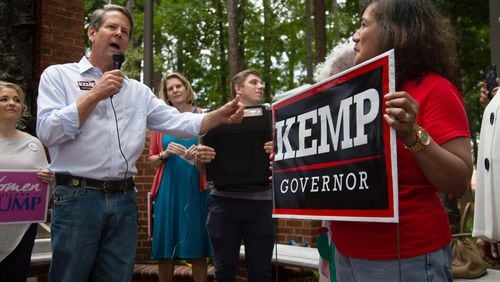 Secretary of State Brian Kemp talks to a small crowd at a rally at the Roswell City Hall Sunday, July 22, 2018. STEVE SCHAEFER / SPECIAL TO THE AJC