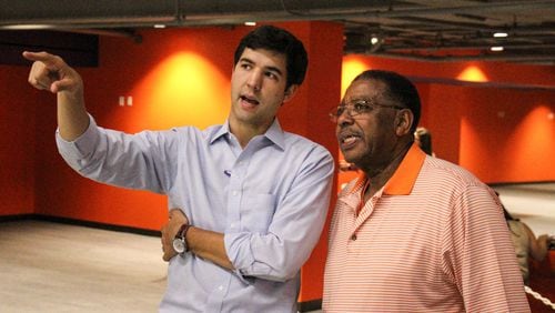Georgia Tech graduate Graham Neff has risen to the No. 2 position in the Clemson athletic department.  In this photo, Neff was showing renovations to Littlejohn Coliseum to Jim Bostic, a  board member of Clemson's fundraising arm. (Courtesy Graham Neff)