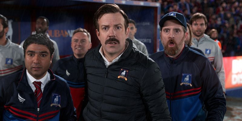 Nick Mohammed (left), Jason Sudeikis and Brendan Hunt in "Ted Lasso," produced by Warner Bros. Television and airing on Apple TV+. (Apple TV+/TNS)