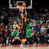Atlanta Hawks guard Dejounte Murray (5) hits a game-winning basket during overtime in an NBA basketball game against the Boston Celtics Thursday, March 28, 2024, in Atlanta. The Hawks won 123-122 in overtime. (AP Photo/John Bazemore)