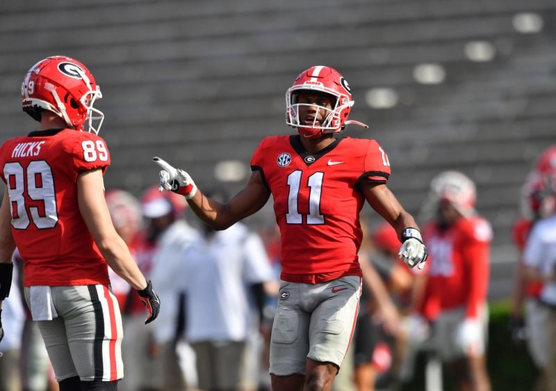 Georgia's wide receiver Arian Smith (11) celebrates after catching a pass during the G - Day game at Sanford Stadium, Saturday, April 15, 2023, in Athens. (Hyosub Shin / Hyosub.Shin@ajc.com) 
