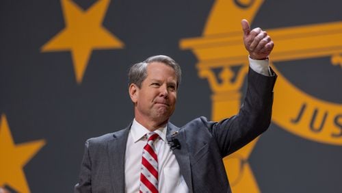 Gov. Brian Kemp waves before he leaves the stage at his inauguration ceremony at Georgia State University Convocation Center in Atlanta on Thursday, Jan. 12, 2023, where he talked about his pay raise proposal for teachers. (Arvin Temkar / arvin.temkar@ajc.com)