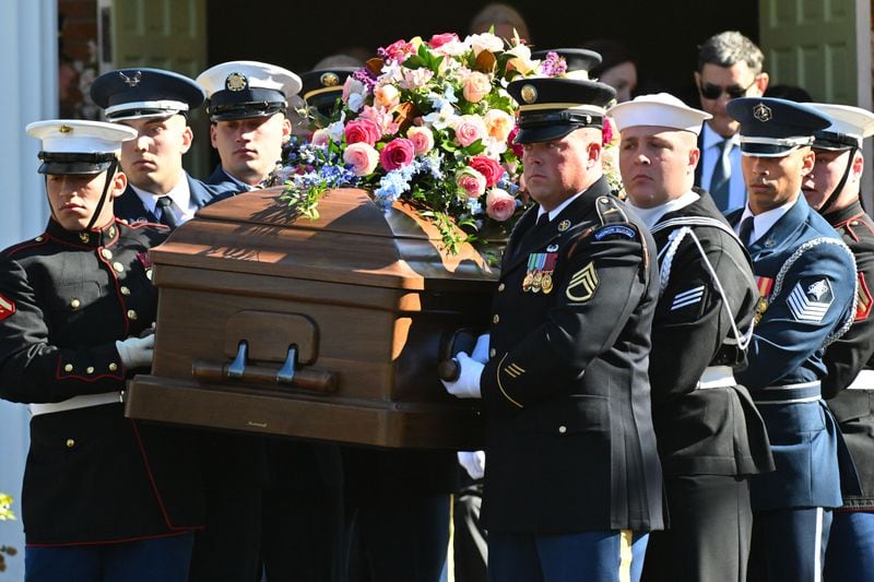 U.S. service members carry former first lady Rosalynn Carter's casket from Maranatha Baptist Church in Plains Wednesday, Nov. 29, 2023.
Miguel Martinez /miguel.martinezjimenez@ajc.com