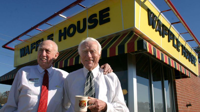 Joe Rogers, Sr. (left) and Tom Forkner (right) started the Waffle House chain in 1955, in Avondale Estates. Rogers and Forkner pose outside a Waffle House off Old Peachtree Rd. and I-85 in Duluth. With more than 1,500 restaurants, Waffle House has become a southern icon.