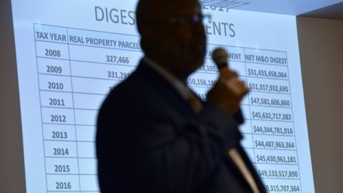 Dwight Robinson, chef appraiser, speaks before Fulton County citizens during Emergency Town Hall Meeting to discuss about Property Tax Assessments hosted by Fulton County Office of Chairman John Eaves at Harriett G. Darnell Senior Multipurpose Facility on Tuesday, June 13, 2017. HYOSUB SHIN / HSHIN@AJC.COM AJC FILE PHOTO