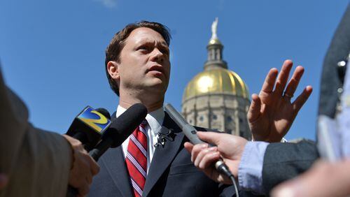 State Senator Jason Carter, running for governor of Georgia, speaks during a press conference Tuesday, April 8, 2014. Carter has called for an independent investigation into Gov. Nathan Deal's 2010 campaign.