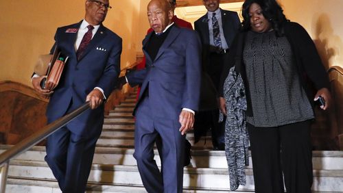 March 2, 2020 - Atlanta - Congressman John Lewis (center) departs the Capitol alongside Rep. Calvin Smyre, D - Columbus, after he signed paperwork to qualify for reelection to his District 5 seat.  A large turnout by both Democrats and Republicans on the first day of election qualifying resulted in long lines of politicians waiting to sign in.   Bob Andres / robert.andres@ajc.com