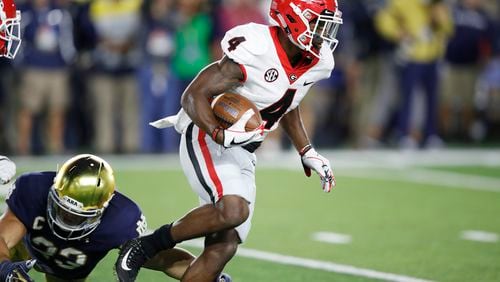Mecole Hardman #4 of the Georgia Bulldogs returns a kick against the Notre Dame Fighting Irish in the second quarter of a game at Notre Dame Stadium on September 9, 2017 in South Bend, Indiana. (Photo by Joe Robbins/Getty Images)
