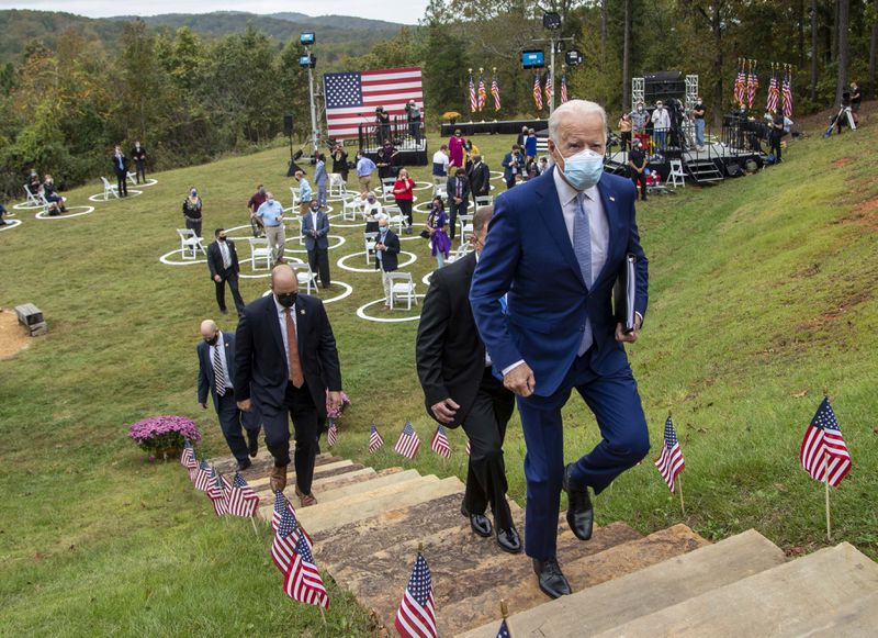 10/27/2020 - Democratic Presidential nominee and former Vice President Joe Biden is followed by Secret Service Agents as he leaves a rally at Mountain Top Inn & Resort in Warm Springs, Tuesday, October 27, 2020. MANDATORY CREDIT: ALYSSA POINTER / THE ATLANTA JOURNAL-CONSTITUTION