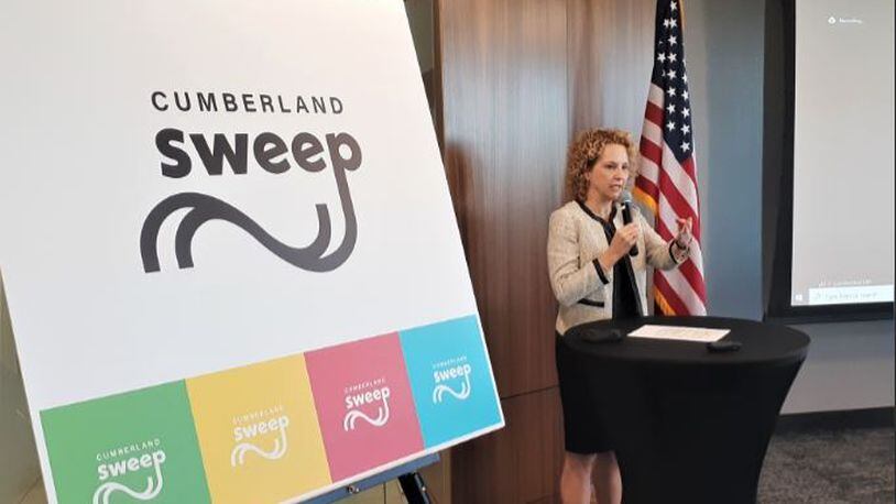 Cumberland CID Executive Director Kim Menefee on Thursday presents plans for the Cumberland Sweep, a three-mile multimodal path planned to be built around The Battery Atlanta. (Matt Bruce/AJC)