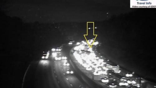 All lanes were blocked temporarily in DeKalb County along I-285 West at Flat Shoals Rd/Candler Rd.