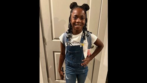 The mother of Nevaeh Walker, a 10-year-old Dutchtown Elementary School student, is seeking charges against an employee of the school who she alleges struck her daughter on her back because the child's Chromebook was not charged. Courtesy photo.