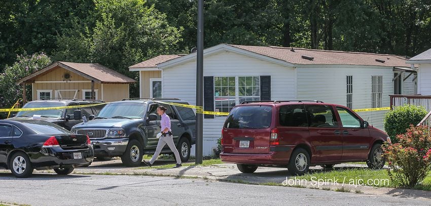 Photos: Children, father stabbed to death in Loganville