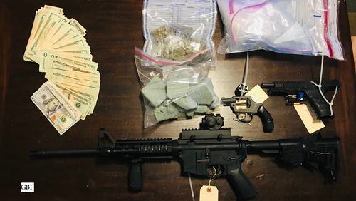 A 43-year-old Marietta man faces drug and weapons charges after GBI agents and local police conducted a raid at a South Fulton home, authorities said.