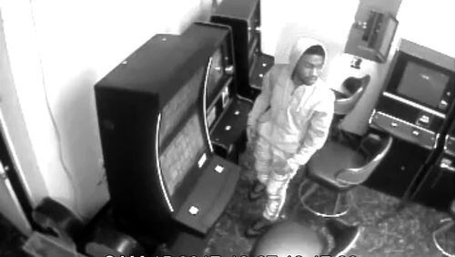 Atlanta police want to identify this man, accused of robbing a southwest Atlanta convenience store at gunpoint.