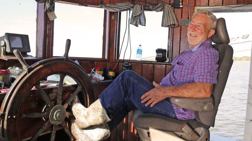 Capt. Eddie Poppell behind the wheel of the Sea Fox shrimp trawler.
Contributed by Eric Dusenbery