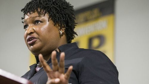 Stacey Abrams speaks to a crowd at a campaign event. The Democratic candidate for governor created two nonprofit foundations that helped to establish her as a major political figure in Georgia.