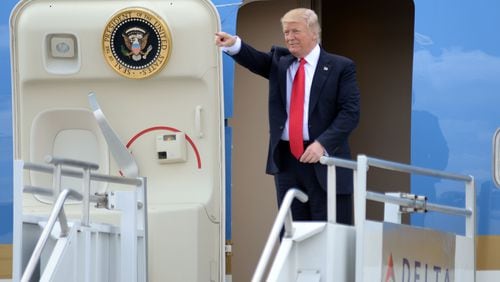 APRIL 28, 2017 ATLANTA President Donald Trump arrives at Hartsfield Jackson International Airport, aboard Air Force One, Friday April 28, 2017. Trump is in town for a speech to the National Rifle Association's convention and a fundraiser for 6th District candidate Karen Handel. KENT D. JOHNSON/ kdjohnson@ajc.com