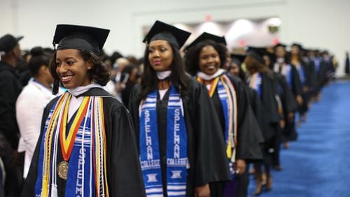 Spelman graduates enter the Spelman College commencement, Sunday, May 15, 2016, at the Georgia International Convention Center in College Park. BRANDEN CAMP/SPECIAL Spelman graduates enter the Spelman College commencement, Sunday, May 15, 2016, at the Georgia International Convention Center in College Park. BRANDEN CAMP/SPECIAL