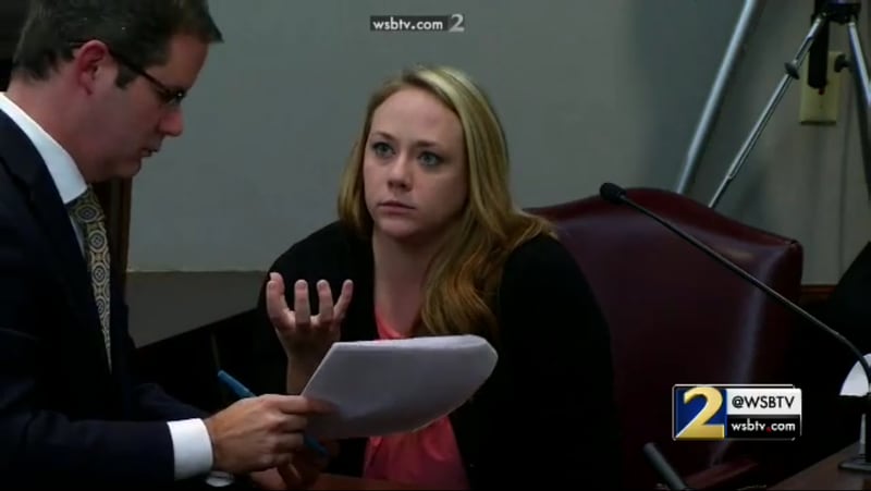 Leanna Taylor, the ex-wife of Justin Ross Harris, explains a point to prosecutor Chuck Boring during cross-examination, during Harris' murder trial at the Glynn County Courthouse in Brunswick, Ga., on Monday, Oct. 31, 2016. (screen capture via WSB-TV)