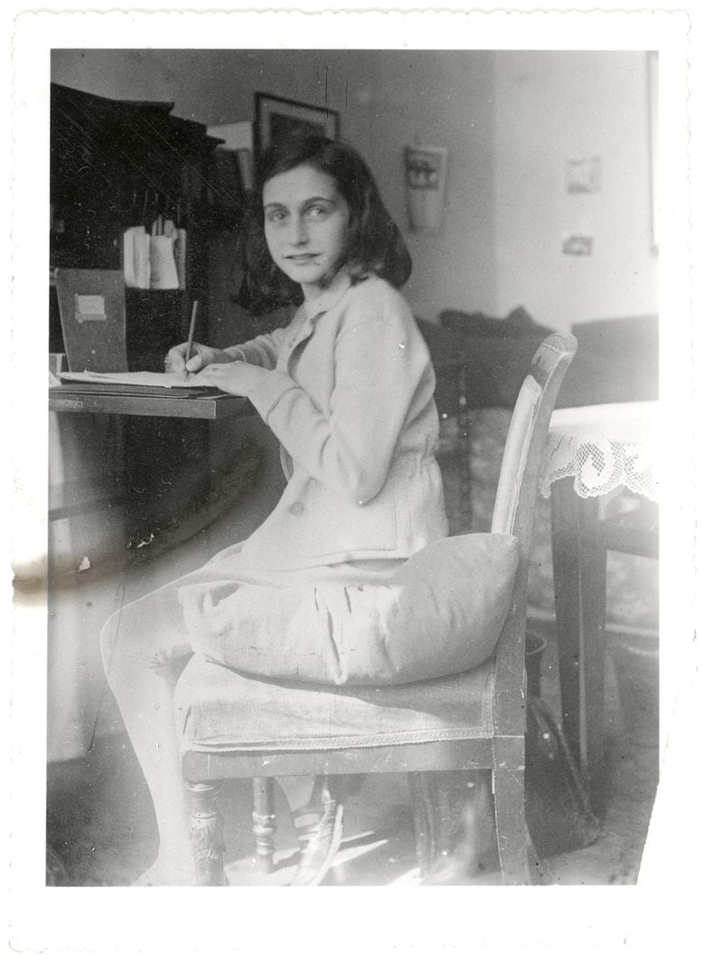 Anne Frank is writing in this April 1941 image released by Anne Frank Foundation, Basel/ The Anne Frank House, Amsterdam, on Tuesday, April 11, 2006. The exhibition, "Anne Frank: Her life in Letters" , an exhibition of letters, postcards and family notes, some of them never displayed before, opens Wednesday at the Amsterdam Historical Museum and closes Sept. 3, 2006. (AP Photo/ AFF Basel/AFS Amsterdam)  NO SALES, EDITORIAL USE ONLY
