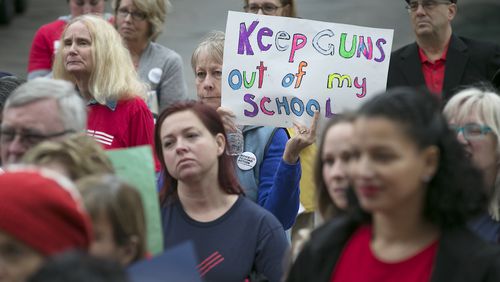 Women representing Moms Demand Action for Gun Sense in America gathered at the Capitol on Tuesday to voice their concerns with legislation from lawmakers allowing more freedom for gun advocates. RALPH BARRERA/AMERICAN-STATESMAN