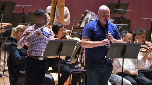 February 6, 2019 Atlanta - Musicians with wind ensemble Imani Winds, the 2019 ASO Talent Development Program Aspire Award winners, perform during a rehearsal at Atlanta Symphony Orchestra on Wednesday, February 6, 2019. The Atlanta Symphony Orchestra's (ASO) Talent Development Program(TM) (TDP) celebrates 25 years since the launch of one of the first-of-its-kind initiatives among U.S. orchestras to identify, mentor and develop middle and high school Atlanta musicians of African American and Latino heritage for careers as professional classical musicians. The historic program will celebrate with a concert featuring TDP alumni performing with the Atlanta Symphony Orchestra led by Music Director Robert Spano on Saturday, February 9, 2019 at Symphony Hall. HYOSUB SHIN / HSHIN@AJC.COM
