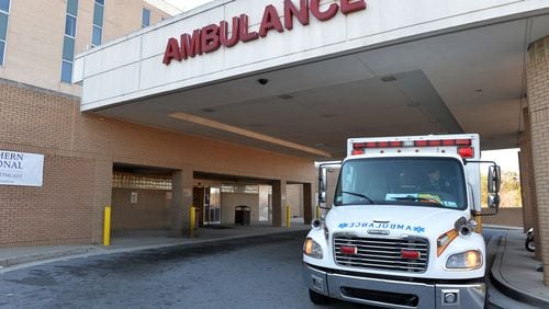 Clayton County ambulances line up in the driveway outside the emergency room of the Southern Regional Medical Center in Riverdale, Friday, January 30, 2015. KENT D. JOHNSON/ KDJOHNSON@AJC.COM