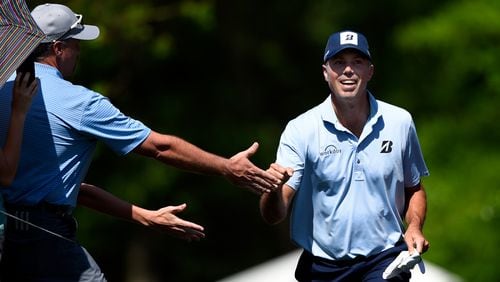 Matt Kuchar gets up close and personal with the gallery at the Houston Open this weekend. (Josh Hedges/Getty Images)