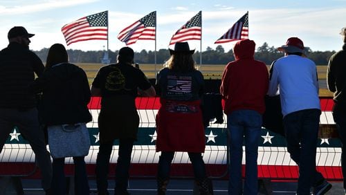 December 5, 2020 Valdosta - A crowd gathers during Republican National Committee's Victory Rally at the Valdosta Flying Services at the airport in Valdosta on Saturday, December 5, 2020, before the expected arrival of President Donald Trump. (Hyosub Shin / Hyosub.Shin@ajc.com)