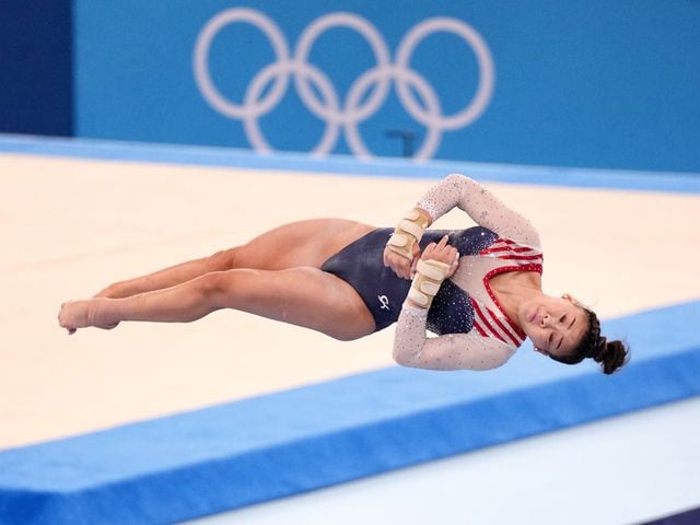 Sunisa Lee of the United States performs on the vault during the women's all-around gymnastics competition at the postponed 2020 Tokyo Olympics in Tokyo on Thursday, July 29, 2021. (Chang W. Lee/The New York Times)