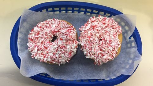 Sublime Doughnut’s yeast doughnut is smeared with white frosting and encrusted with crushed peppermint. (Elizabeth Lenhard)