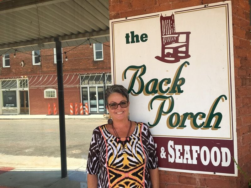 Stacie Stewart, the co-owner of The Back Porch restaurant in Shellman, says it’s too expensive to keep open all nine of Randolph County’s precincts. Mark Niesse / mark.niesse@ajc.com