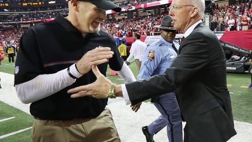 January 14, 2017, Atlanta: Falcons head coach Dan Quinn and Falcons president Rich McKay celebrate a 36-20 victory over the Seahawks during a NFL football NFC divisional playoff game on Saturday, Jan. 14, 2017, in Atlanta. Curtis Compton/ccompton@ajc.com