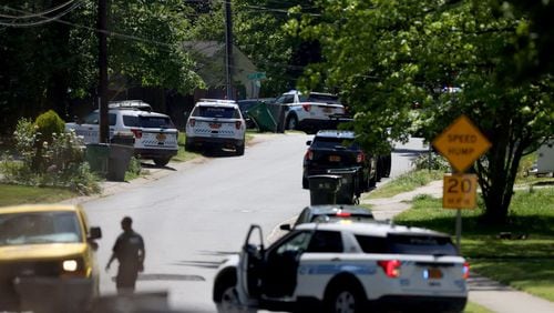 Police investigate the scene where multiple law enforcement officers were shot on April 29 in east Charlotte. (Khadejeh Nikouyeh/The Charlotte Observer/TNS)