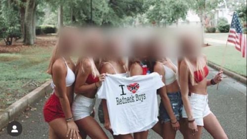 A petition is calling for the removal of several members of the Daphne High School cheer team after a photo appeared on Instagram showing them posing with a T-shirt that depicted the Confederate battle flag and the phrase “I love redneck boys.” One of only two Black squad members quit after the first practice because she said coaches and teammates refused to address the matter which had been brewing among them for two weeks.