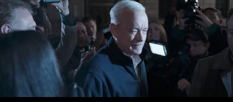 Laura Lundy Wheale appears in this scene with Tom Hanks. Image: Warner Bros.