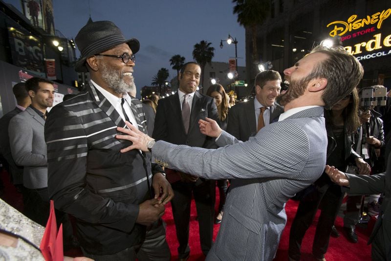 Cast members Samuel L. Jackson (L) and Chris Evans talk at the premiere of "Avengers: Age of Ultron" at Dolby theatre in Hollywood, California April 13, 2015. The movie opens in the U.S. on May 1. REUTERS/Mario Anzuoni