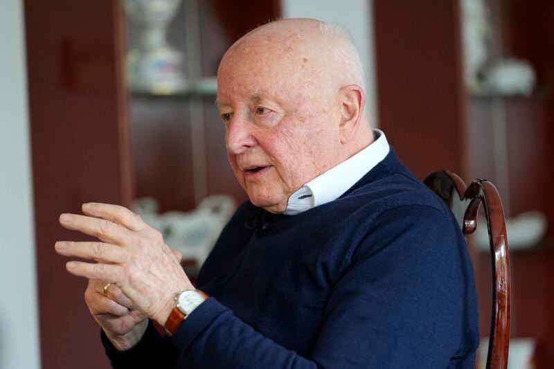 Holocaust survivor Herbert Rubinstein talks during an interview with The Associated Press at his home in Duesseldorf, Germany, Thursday, April 25, 2024. Holocaust survivors from around the globe participating in a new digital campaign called "#CancelHate" which features videos of them reading Holocaust denial posts from different social media platforms. (AP Photo/Martin Meissner)