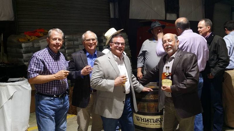 When it's time to check out you might as well have a guy with good taste in whiskey laying you out. James "Chopdaddy" Southerland, center, is the guy to know when it's time to go.