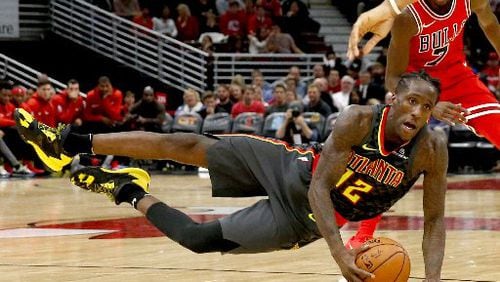Taurean Prince and the Hawks fell at Chicago. (AP Photo)