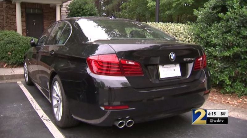 John Martin Hill defrauded an Alpharetta woman out of $80,000 and used the proceeds to purchase this BMW 535d, police said. The vehicle was parked outside his last known address in Duluth on Wednesday, according to Channel 2 Action News.